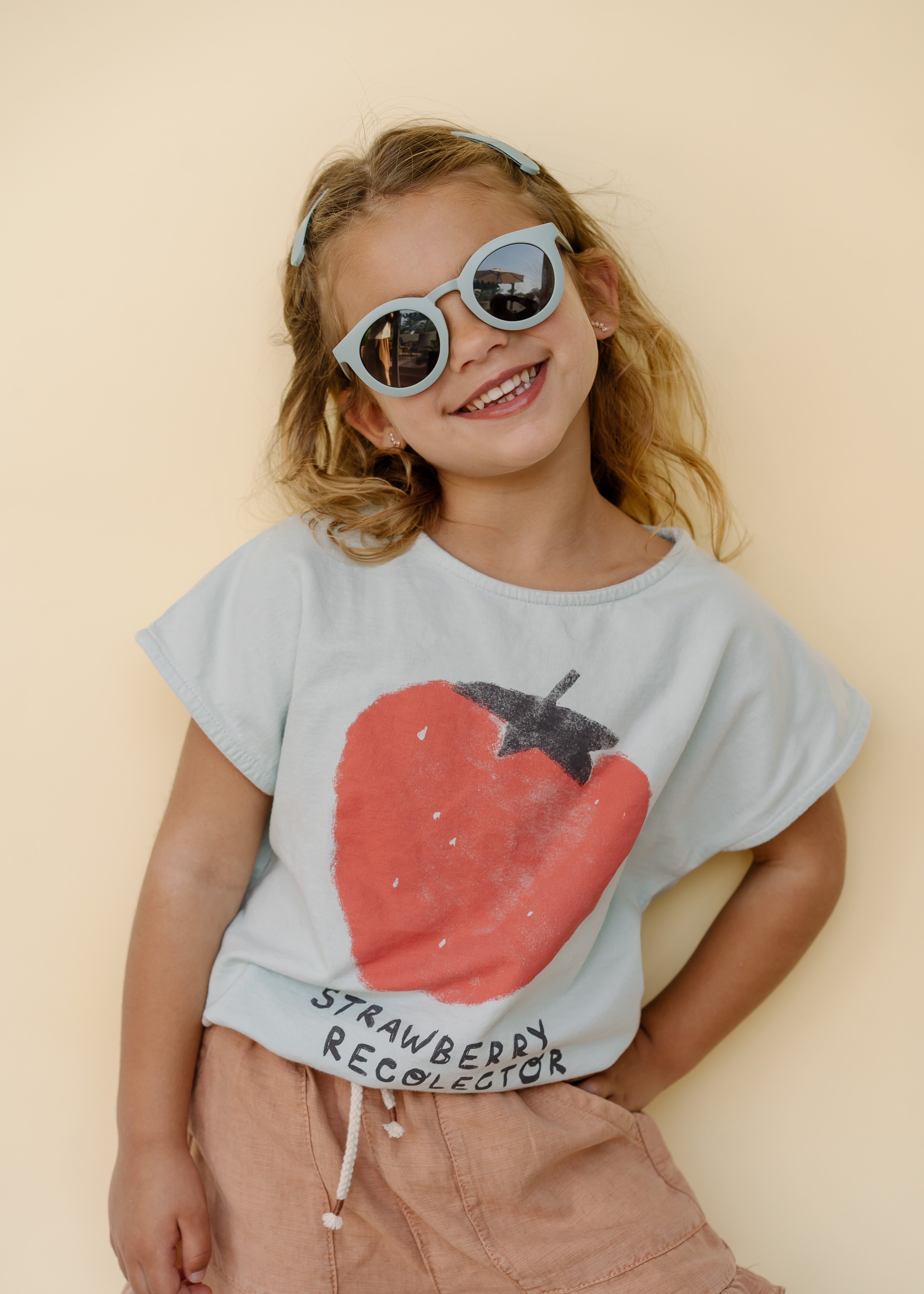 Sustainable sunglasses in blue are made with eco-friendly/non-toxic break-resistant material with polarised lenses & UV400. Family matching sunglasses available