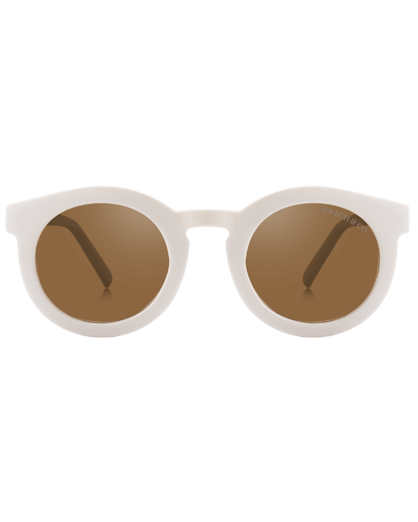 Sustainable sunglasses in white for adults y Grech&Co are eco-friendly sunglasses with polarised lenses & with UV400 protection. Mini-Me styles are available.