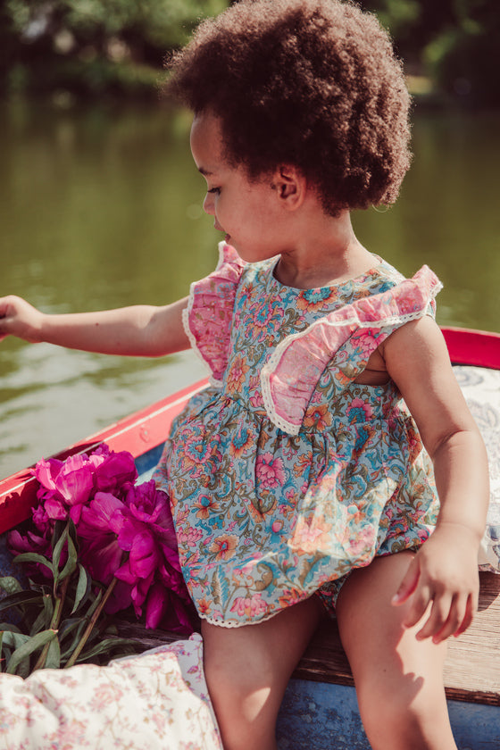 Organic cotton baby romper in water flower pink colour by Louise Misha. Mini Me  fashion to  match with your baby. The best gifts for baby and baby presents.