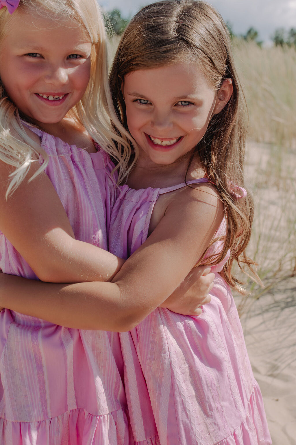 The pink girl dress is made with light, easy-to-wear, practical material and is designed to grow with your child. Mini Me dresses and Mommy and daughter matching is available!