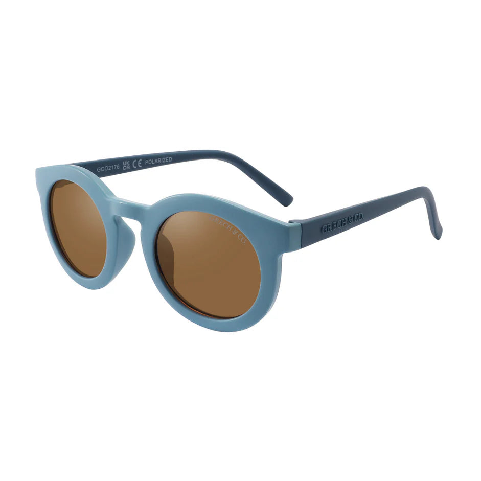 Sustainable sunglasses in blue are made with eco-friendly/non-toxic break-resistant material with polarised lenses & UV400. Family matching sunglasses available