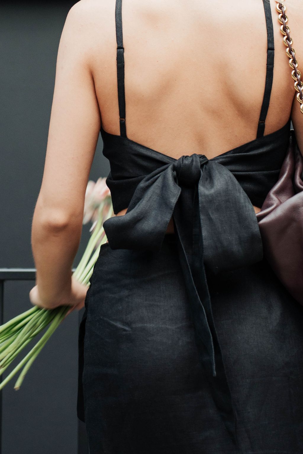 Sydney black linen top with adjustable fit is crafted from premium deadstock linen by artisans. Best linen clothing for modern women at MiliMilu Lifestyle.