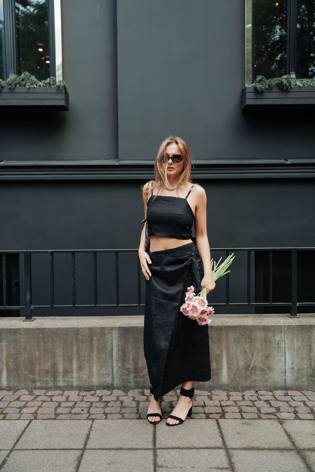 Black linen midi skirt styled with matching top - sustainable fashion set!