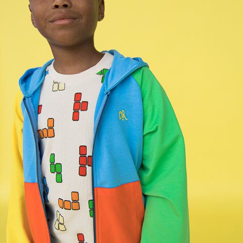 Shop the Blox Crewneck White T-Shirt is a must-have for every kid's wardrobe. With its classic Tetris-style print  t-shirt it's perfect for game-loving kids. Tailored for boys and teenagers, the collection offers a vibrant array of colors to ensure they stand out - unique kids clothing. Organic cotton t-shirt for kids.