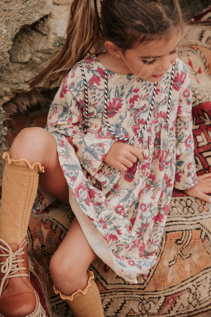 Shop organic cotton girls dresses with bohemian flowers by Louise Misha online in Hong Kong and Singapore. This bohemian-inspired flower girls dress can be worn in summer and winter as it is lightweight and breathable dress. Louise Misha girls dresses on sale, Louise Misha in Hong Kong on sale. Girls muslin dresses.