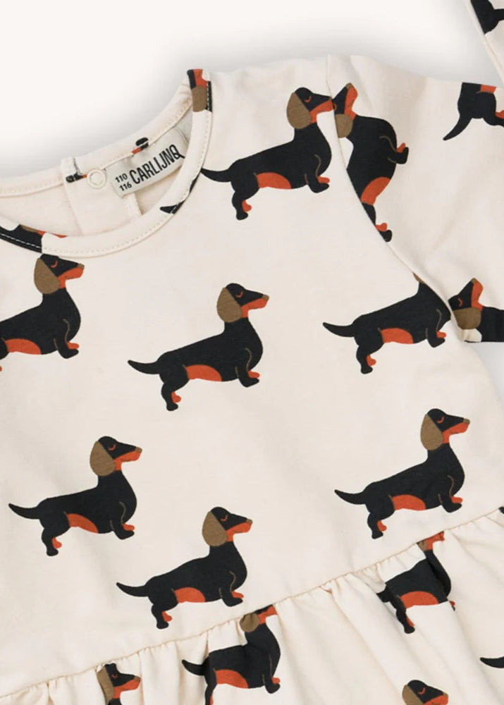 Organic cotton girl's dress with long sleeves & the coolest dachshund print atMiliMilu Lifestyle, shop the best sustainable and organic cotton kids clothing.