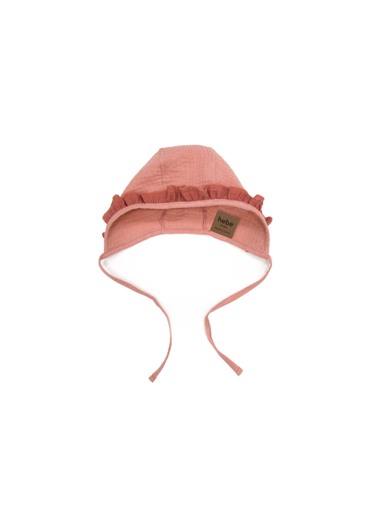 Shop this soft pink organic muslin hat with a darker pink ruffle online in Hong Kong and Singapore at MiliMilu. It's stylish,  breathable and lightweight to keep your little one cosy. Shop organic cotton and eco-friendly accessories and presents for babies online. The best baby girl stocking fillers for Christmas.