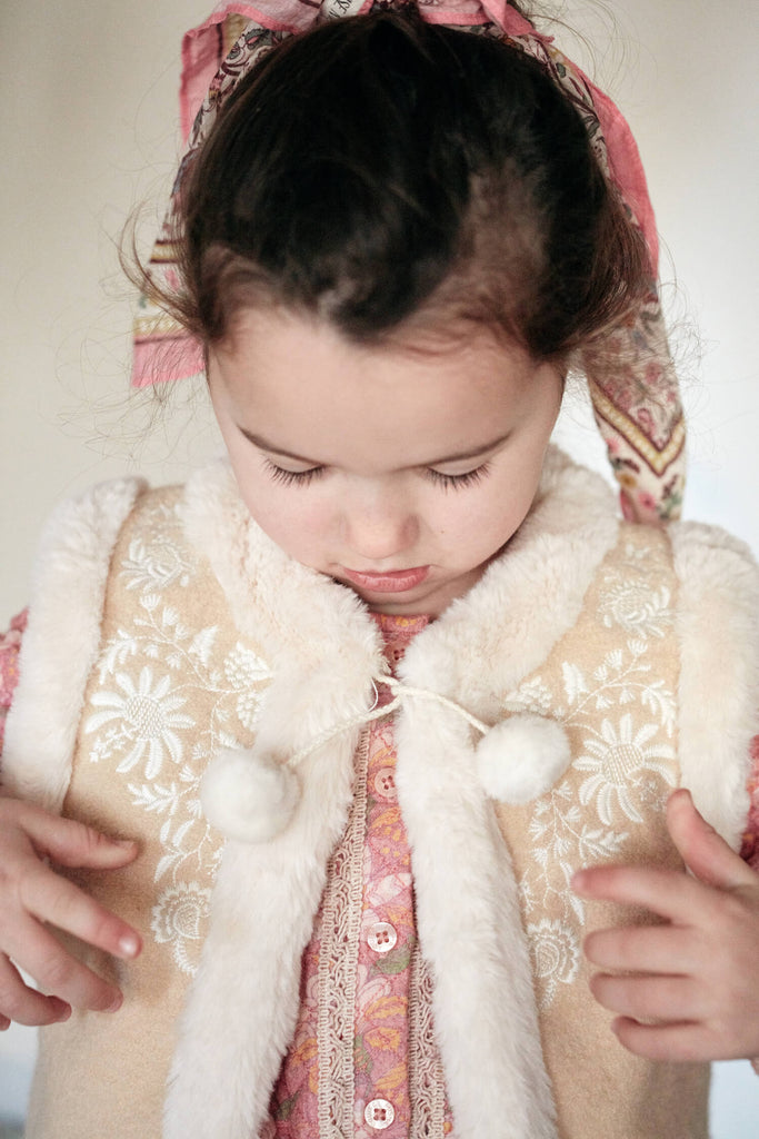 This bio-material vest for girls from Merino wool is soft and warm to wear for girls during winter or colder weather, merino girls wool vest is made by Louise Misha. Mini Me vests are available for Mommy and daughter matching. Available online in Hong Kong and Singapore, also the perfect present for girls.