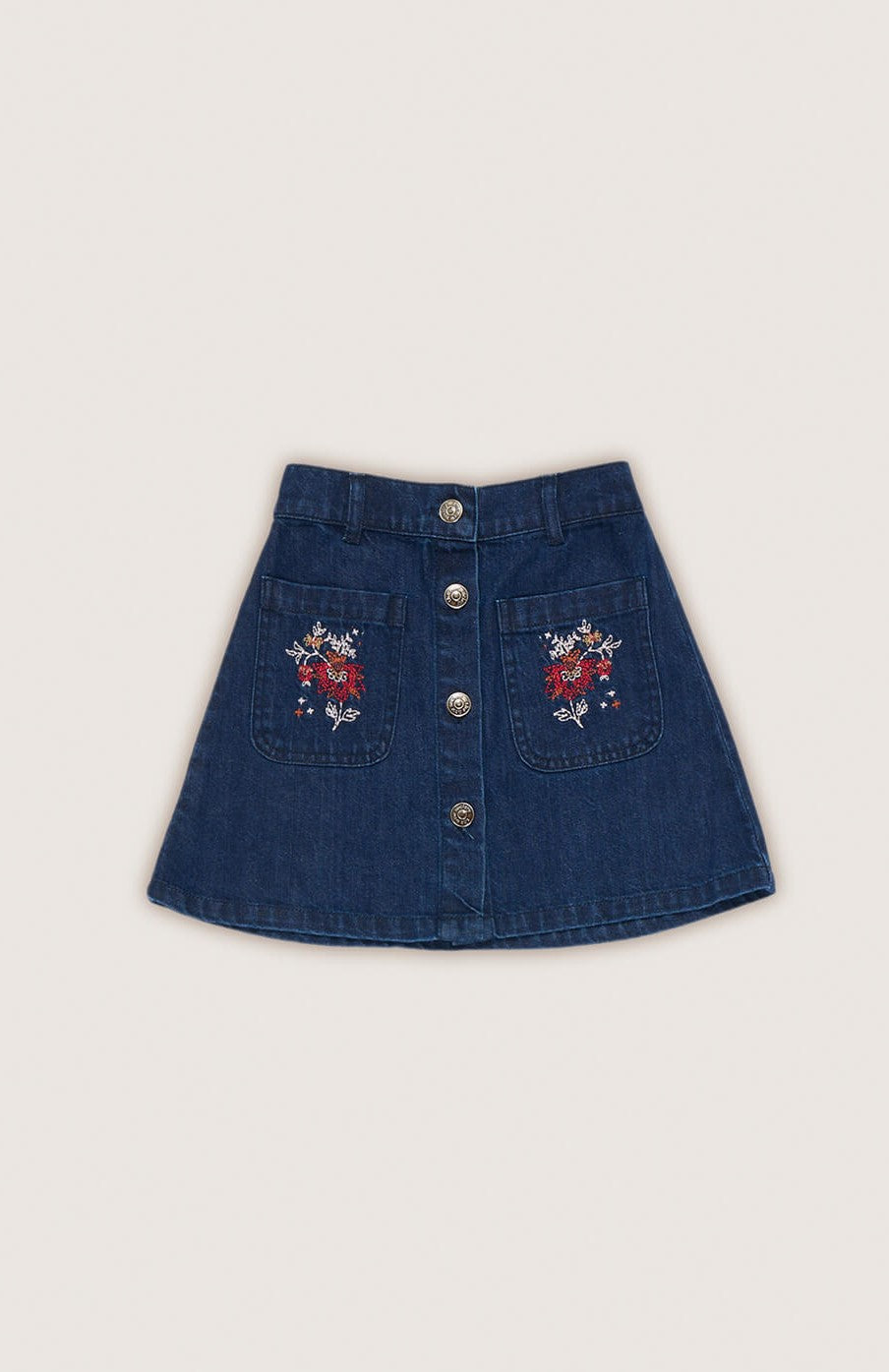 Girls blue denim skirt with flower embroidery, sustainable BCI cotton.