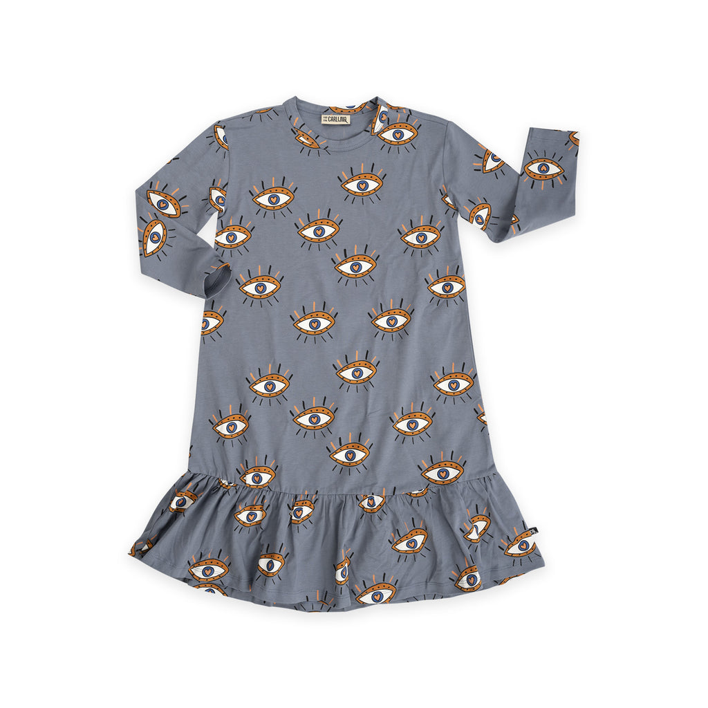 Shop stylish, practical and comfortable long organic cotton girl's dress with heart eyes ( third eye magic!) online in Hong Kong and Singapore at MiliMilu. This heart eye long sleeve and midi dress is made for stylish girls, to wear from parties to climbing trees. Shop stylish and practical kids' clothing and gifts.