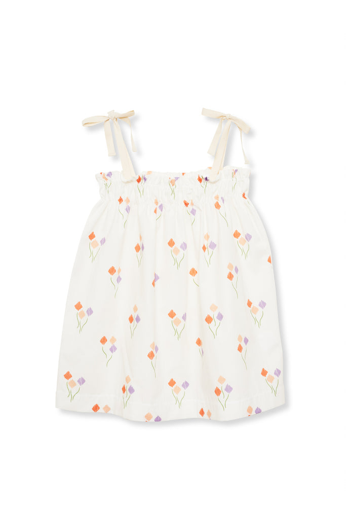 The organic cotton girl dress Basa with tulip print is breathable and lightweight, with drawstring straps. It is made from organic cotton (GOTS) by Jellymade. The organic cotton girl dress is flowy and made with high-quality fabrics—shop girls' dresses and clothing online at MiliMilu in Hong Kong and Singapore.