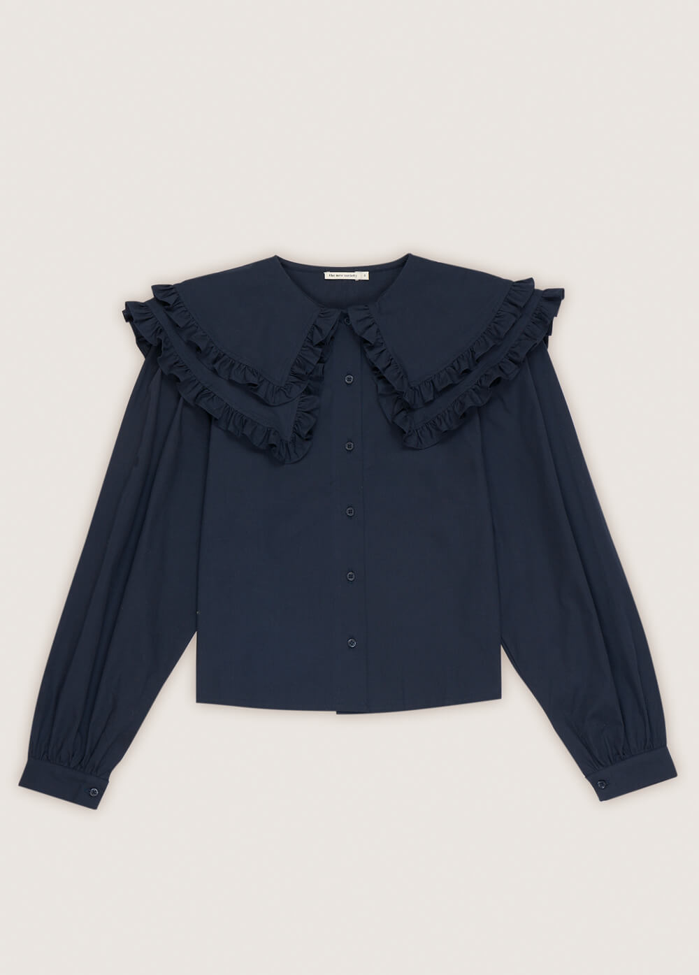 The oversized collar women's blouse is a statement and the most fashionable style this season. This organic cotton women's blouse is in a stunning dark blue colour with a large collar. Shop sustainable women's fashion and organic cotton women's blouses online in Hong Kong and Singapore at MiliMilu.
