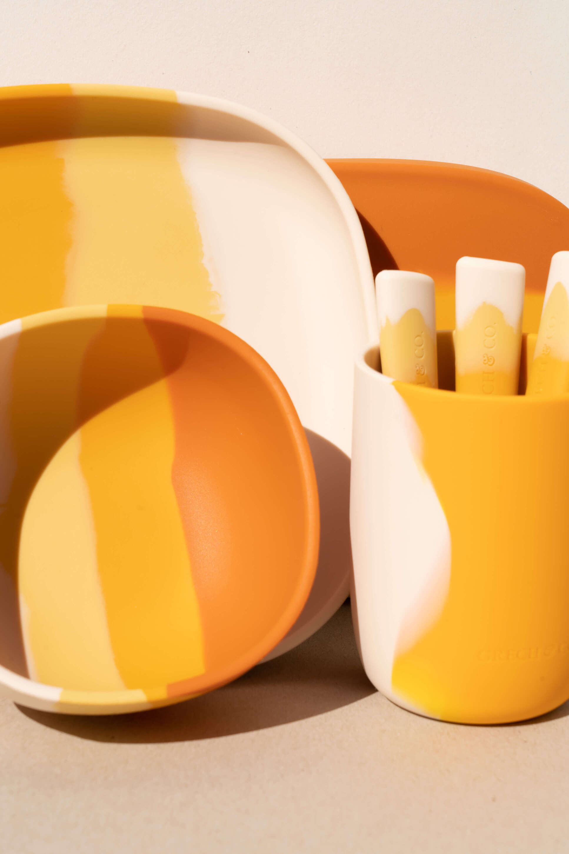 Set of silicon cups for toddlers & kids with easy hold in orange. Made by Grech&Co, the cups are eco-friendly and made of 100% LFGB grade silicone.