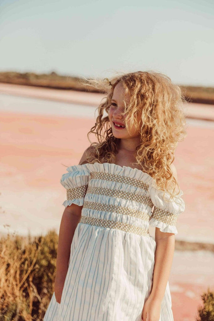 Get your hands on eco-friendly summer dresses for girls and teens at MiliMilu in Hong Kong and Singapore. The Liilu smocked dress in light blue organic cotton is an absolute must-have for all those hot summer days and upcoming holidays. The breathable and organic girl's summer dress is available in Mini Me sizes too!