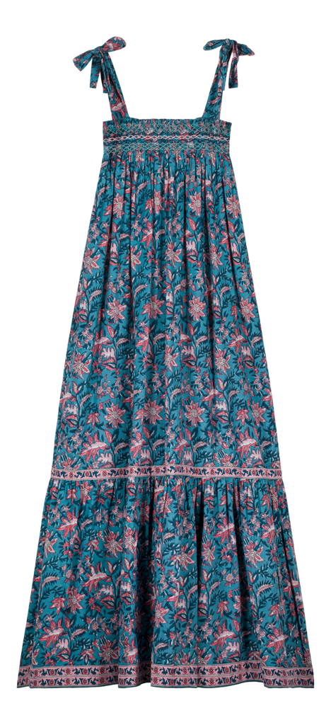 The women's maxi dress Marcelina in Teal Garden of Eden is long, loose-fit, and perfect for summer. This maxi dress is stylish, breathable and lightweight with a handmade contrasted smocking breastplate. This long dress is must have for capsule wardrobe. Maxi dress is part of Mini Me fashion for son and Mommy matching.
