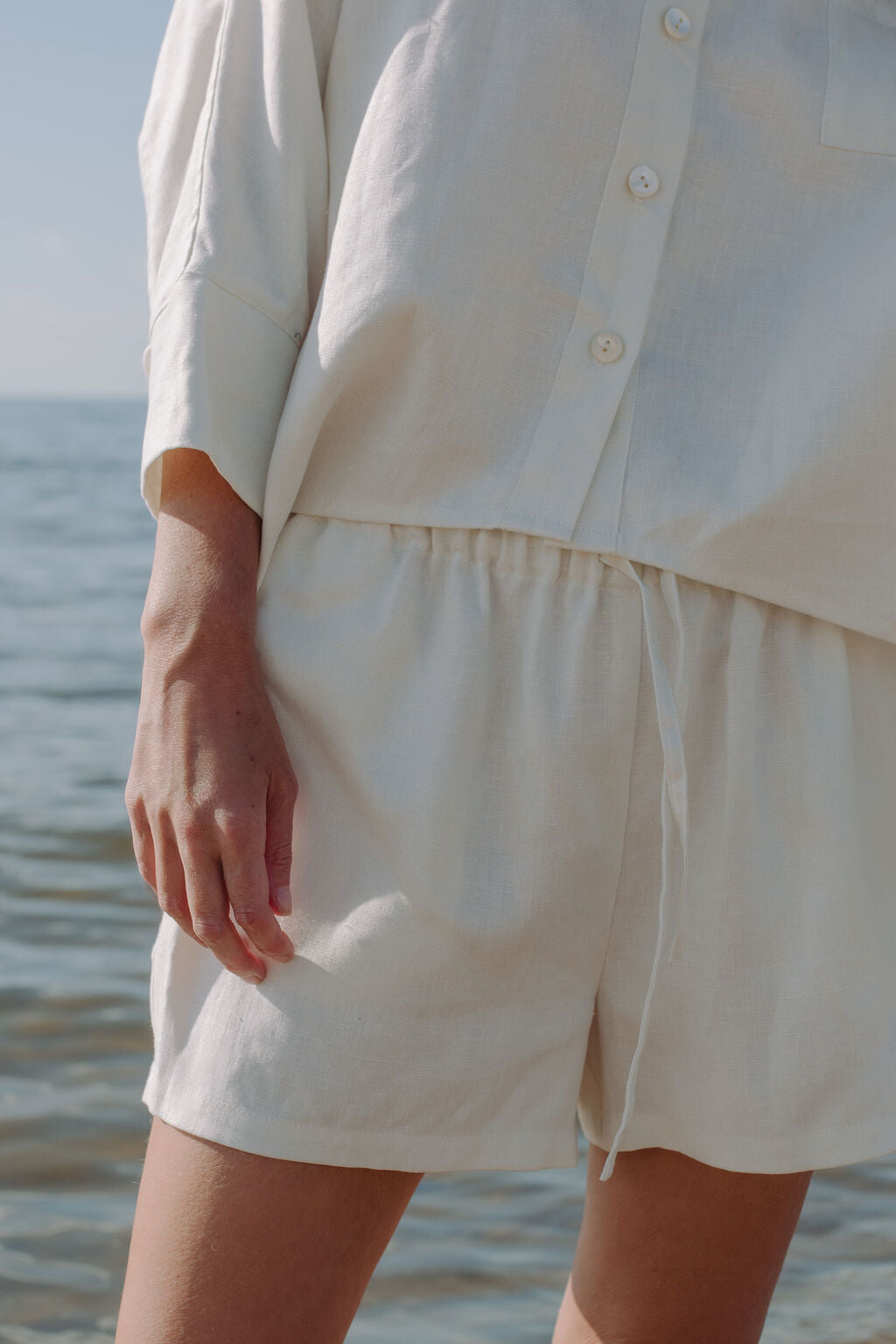 Premium off-white linen shorts for women - front view showcasing comfortable fit and breathable fabric