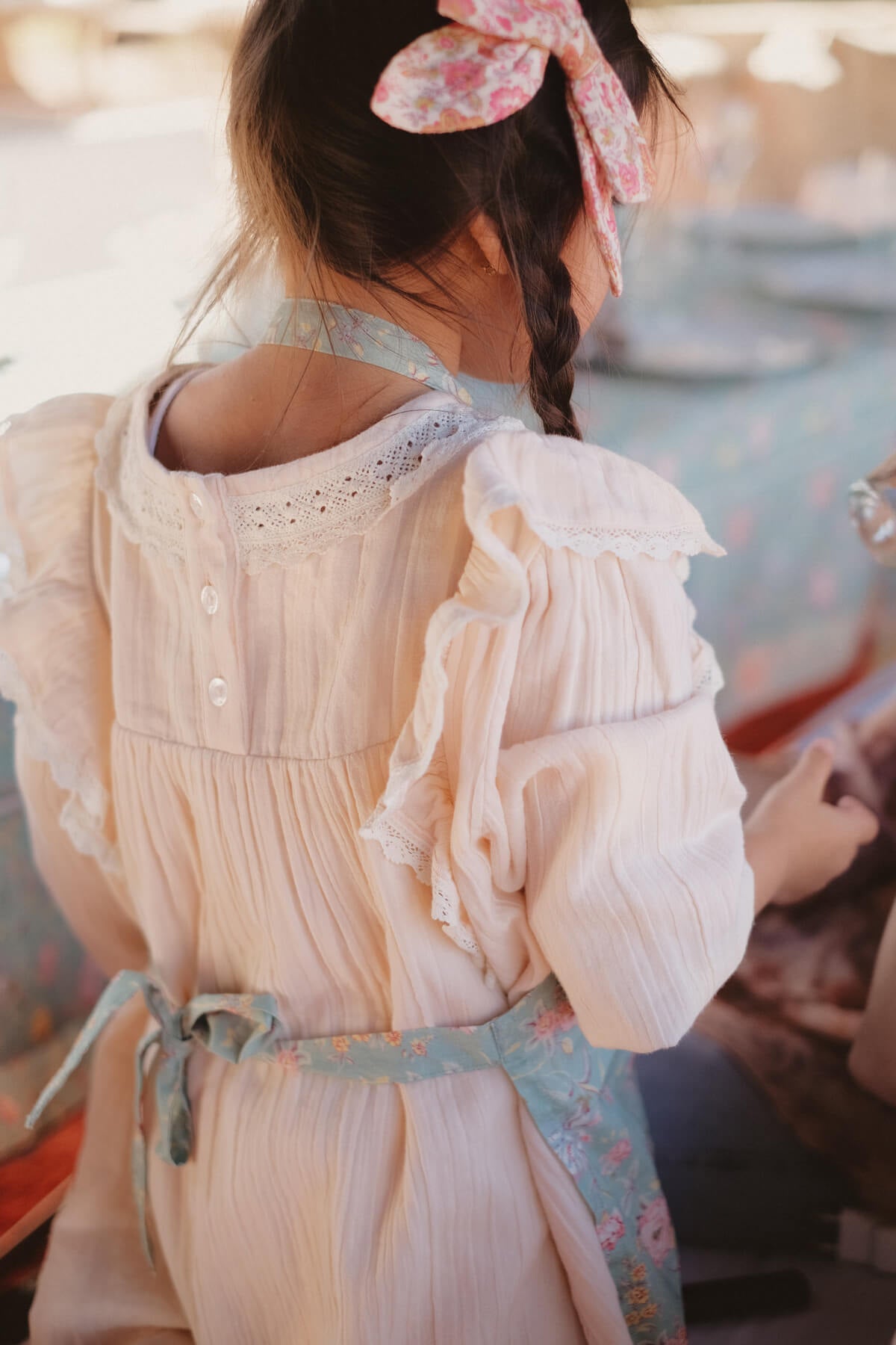 Organic cotton kids aprons in beautiful print online at MiliMilu. The Mini-me apron style is available by Louise Misha. The best Mommy and Me time together!