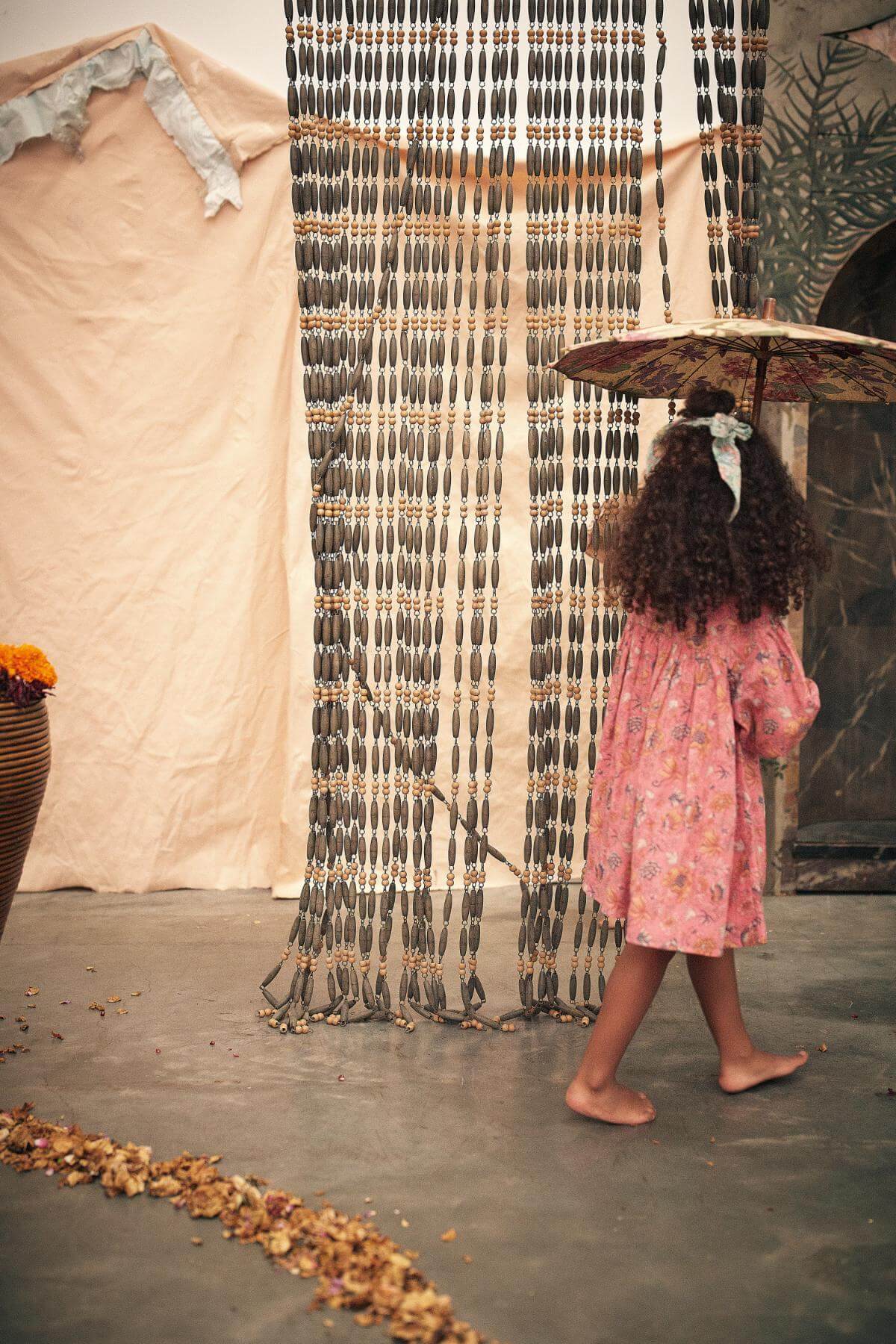 Pink organic cotton girl dress is a perfect summer dress that is flowy, breathable, and lightweight made with organic cotton by Louise Misha. Best girl dress.