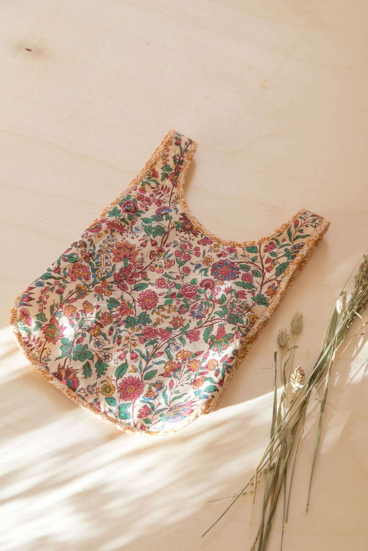 Organic cotton baby bib is adorable and functional with a floral print and terry cloth on the reverse by Louise Misha The best baby gift & baby shower present.
