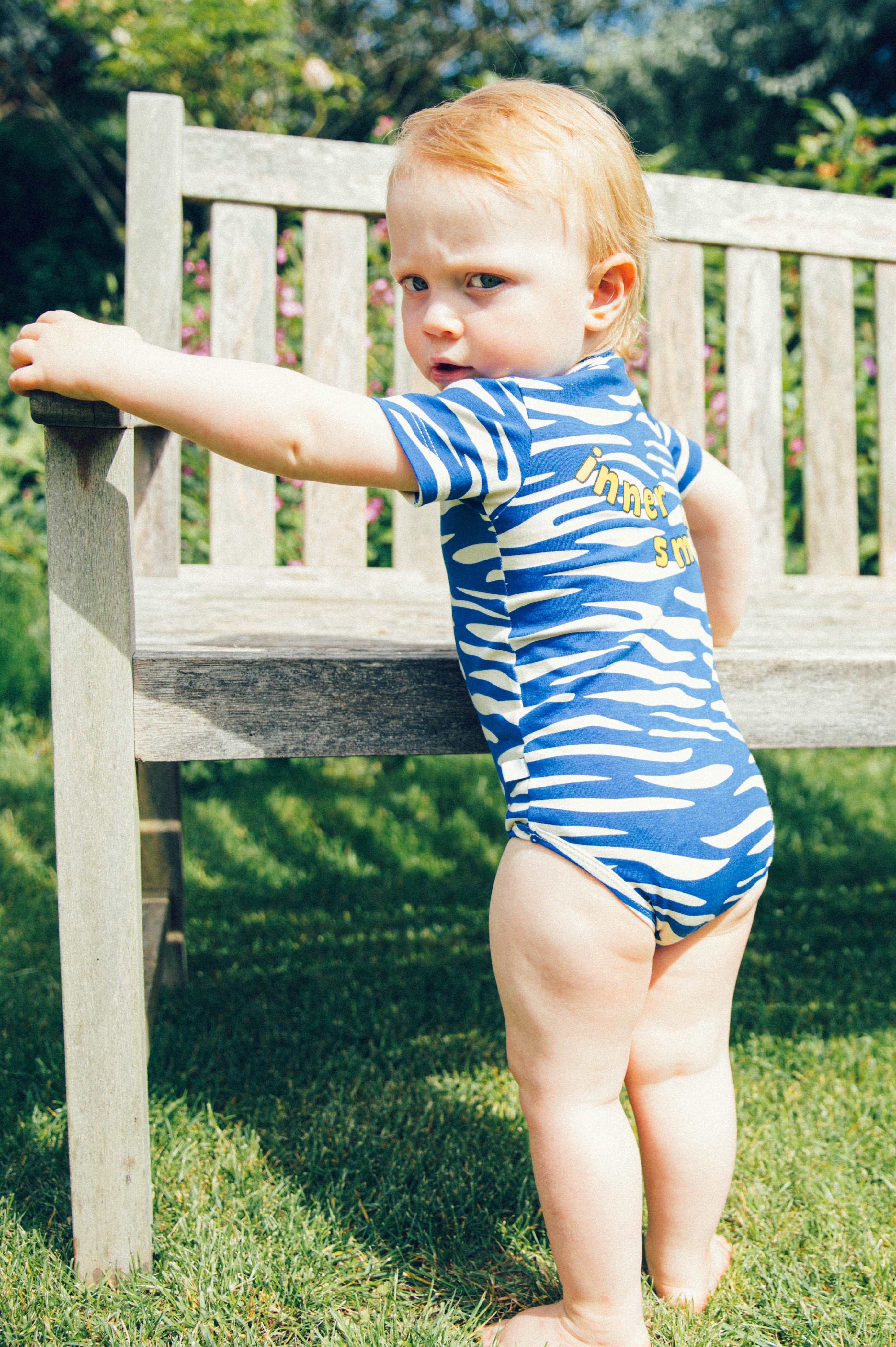 The organic cotton baby body is comfortable and soft for everyday wear with blue stipes and short sleeves, also suitable for sensitive and eczema prone skin.