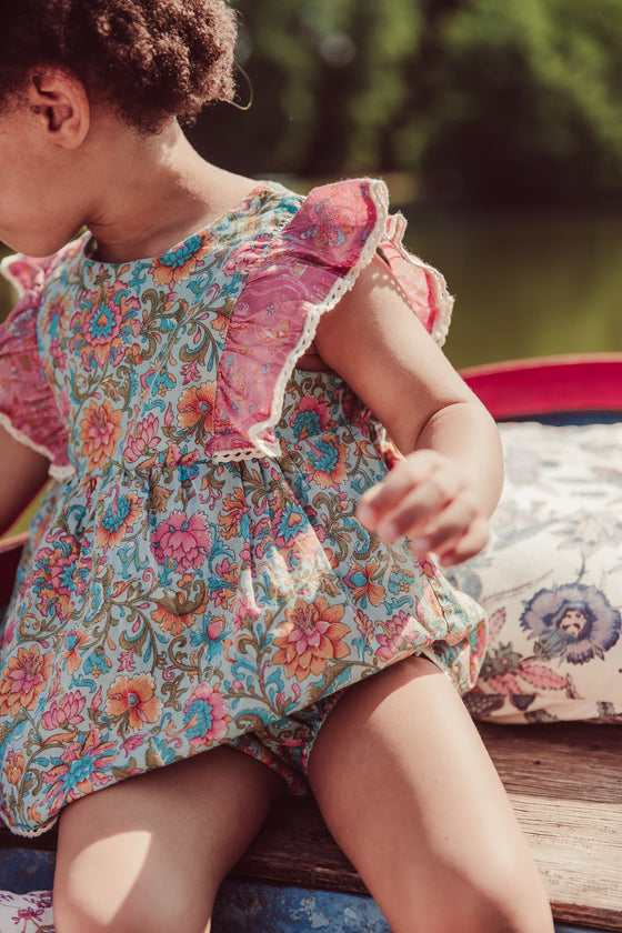 Organic cotton baby romper in water flower pink colour by Louise Misha. Mini Me  fashion to  match with your baby. The best gifts for baby and baby presents.
