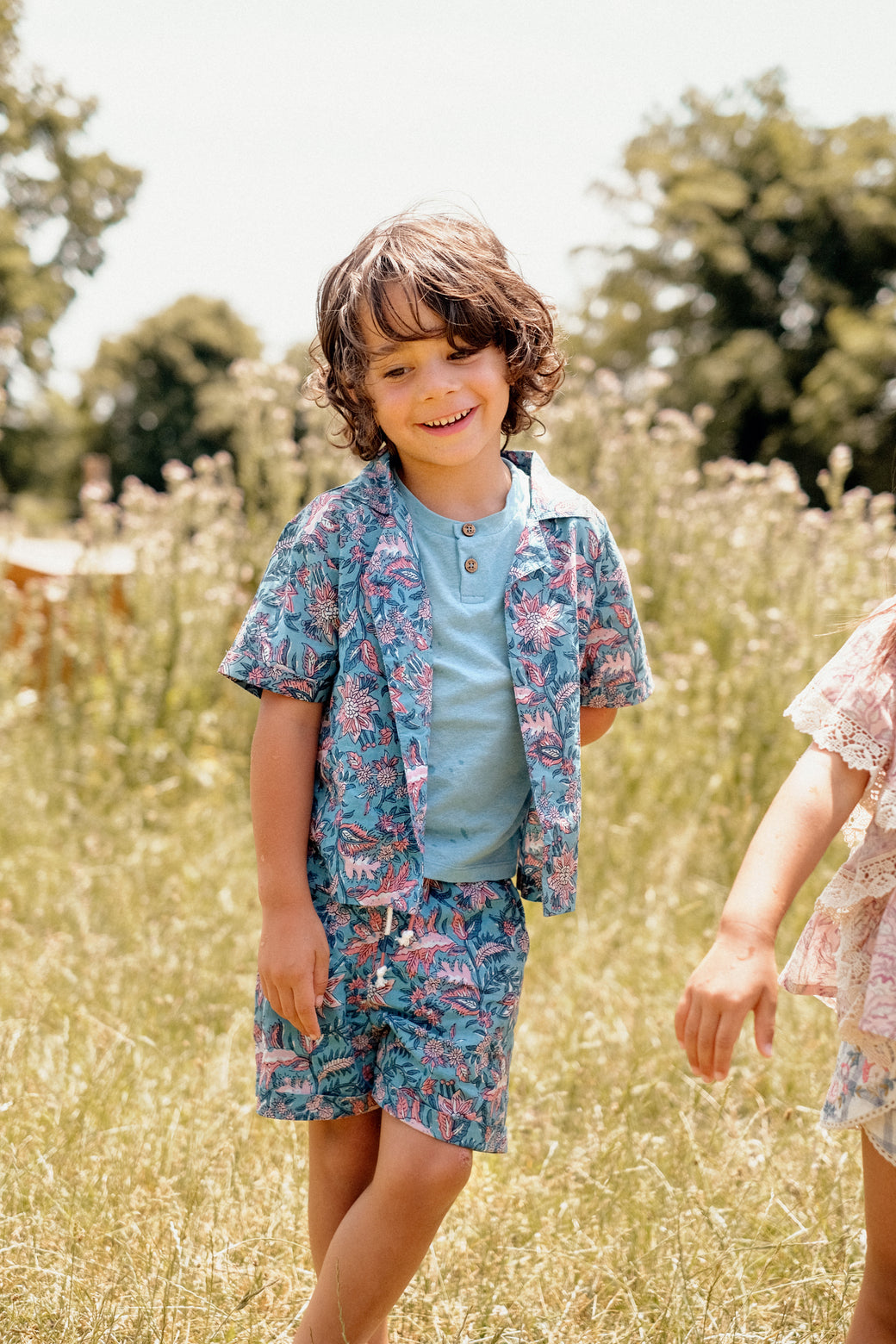 Organic cotton short-sleeved boys shirt in Eden print, is the best summer shirt by Louise Misha. Mini Me for Mommy and son matching is available.