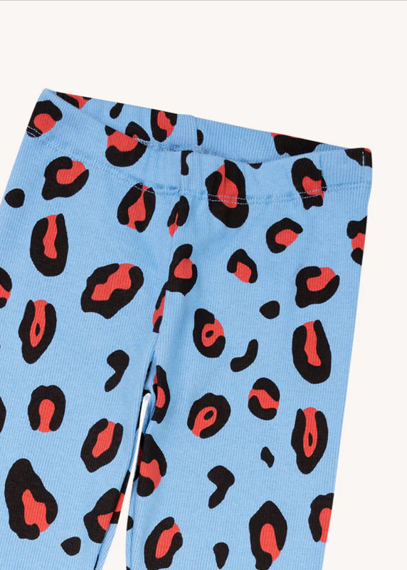Girl wearing CarlijnQ leopard print organic cotton leggings – adjustable waist, sustainable kids clothing
