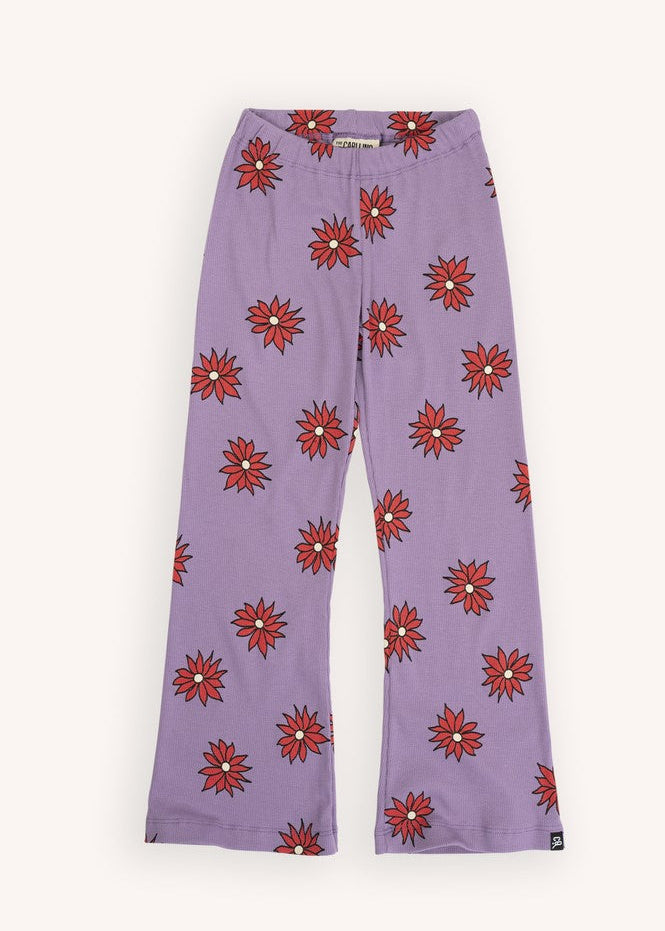 Girl wearing purple dahlia print flare leggings by CarlijnQ - organic cotton