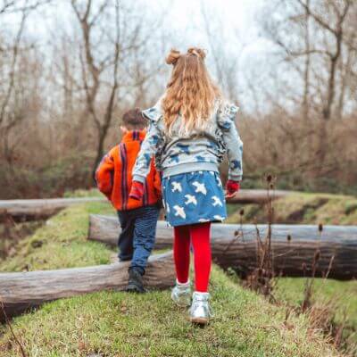 Organic cotton girls & teen mini skirts in blue colour with all-over bird print online at MiliMilu Lifestyle. Sustainable kids fashion & organic cotton clothing