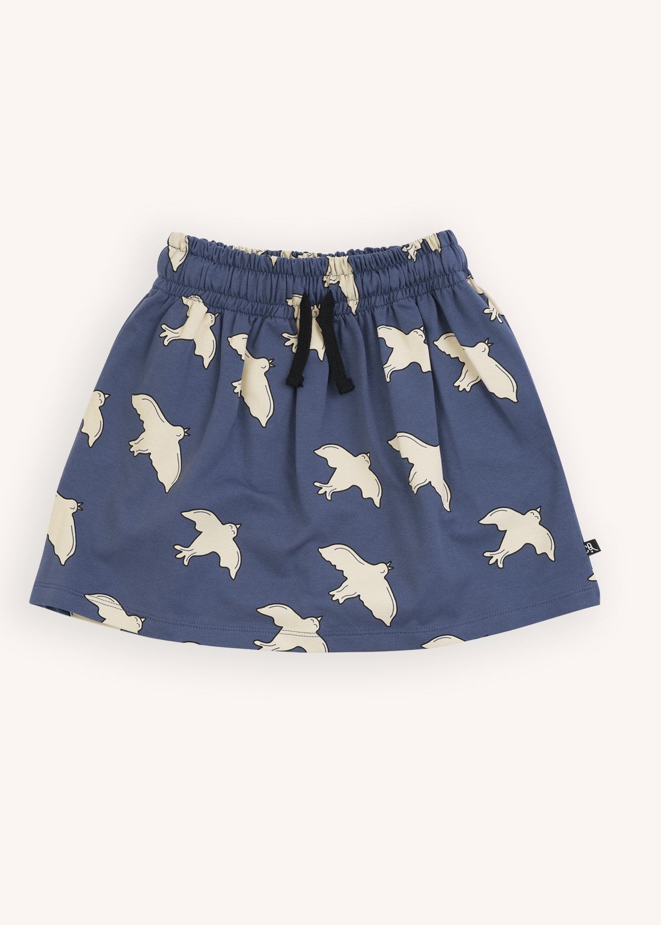 Girl wearing CarlijnQ blue bird print organic cotton mini skirt — sustainable girls fashion | MiliMilu HK SG AU