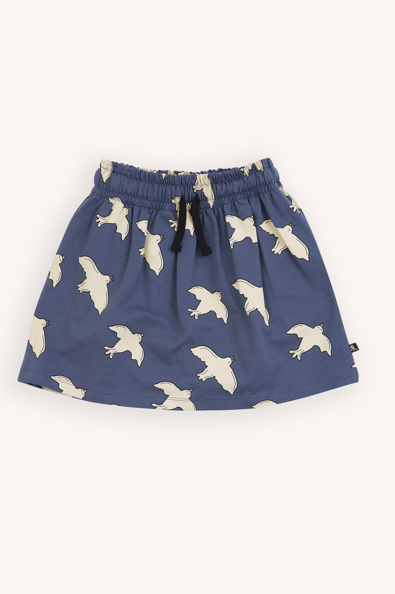 Organic cotton girls & teen mini skirts in blue colour with all-over bird print online at MiliMilu Lifestyle. Sustainable kids fashion & organic cotton clothing