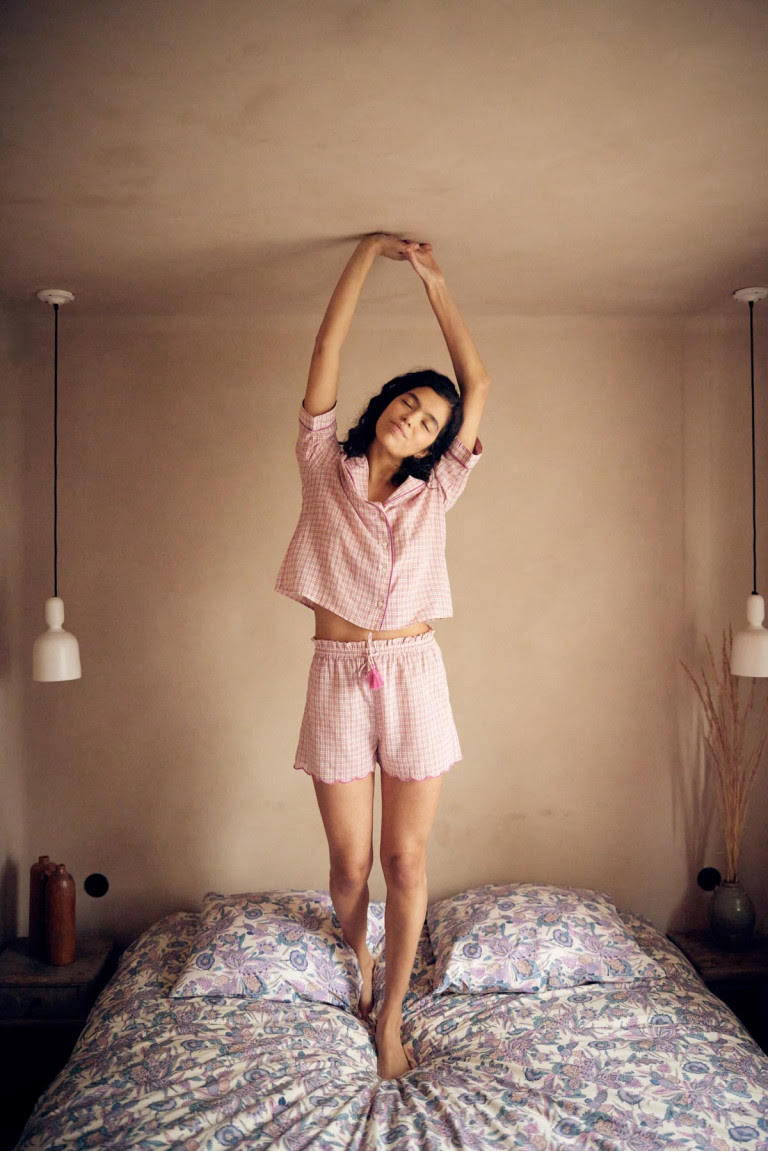 Organic cotton women pyjamas set by Louise Misha in fusia. The set includes shorts and a summery top. Shop the best summer pajamas online at MiliMilu.