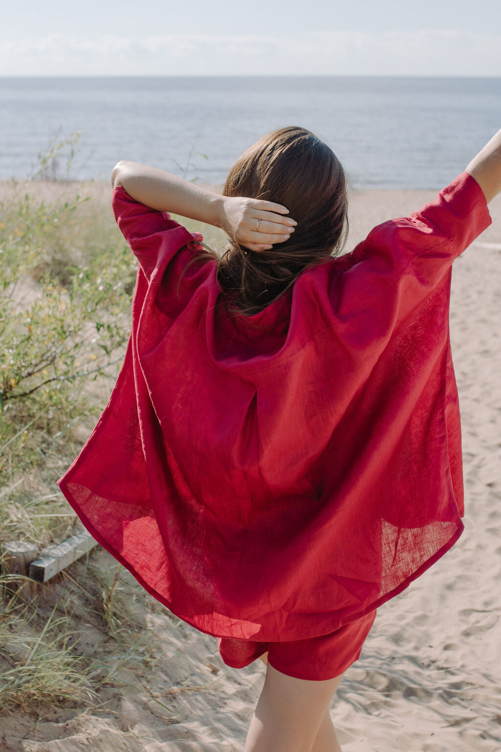 Shop women oversized linen shirt in Garnet red colour, this breathable linen shirt with linen shirts make the best women linen set in red colour.