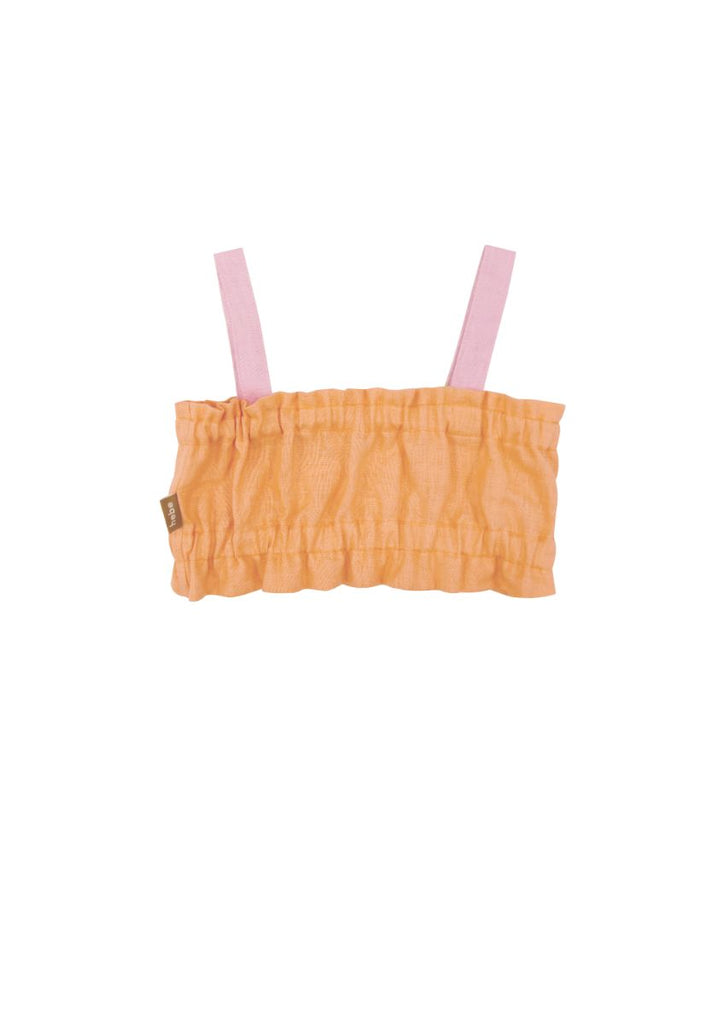 The sustainable and breathable girl's linen cropped top in orange colour will be your favorite top this summer. This top is stylish, and comfortable and will fit more than one season, it is made from high-quality European linen without any harmful chemicals. Milimilu offers sustainable clothing for kids and teens.
