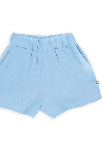 Shop organic muslin fashionable girl shorts with a light blue base and pockets online at MiliMilu. They are made with organic cotton muslin, which is breathable and extra light for wear during the hotter summer months! Milimilu offers the best summer clothing for hot and humid weather. Best gifts and presents for kids.