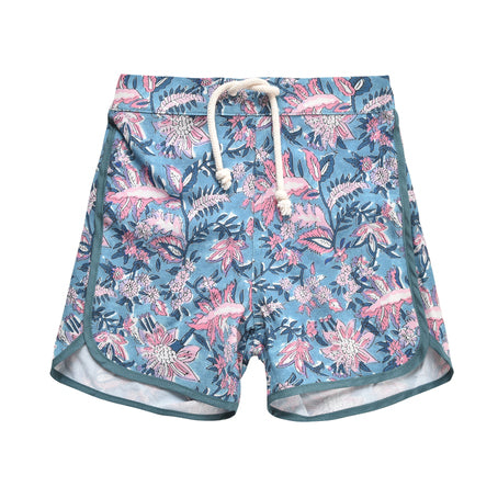 These boy's swim trunks offer an extra trendy twist to ensure your little one stays on trend this summer. Made from a sustainable, recycled material, these swim shorts provide SPF 50 sun protection in a vibrant teal garden print of Eden by Louise Misha. Shop best kids sustainable swimwear online and gifts online.