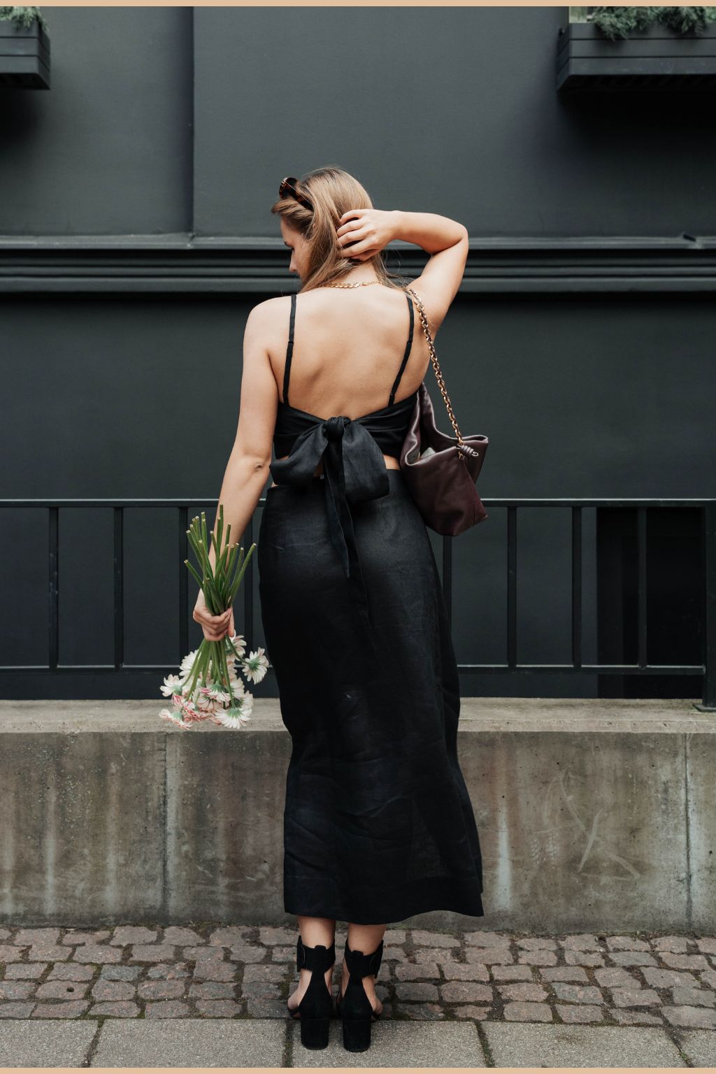 Versatile black linen skirt—ethically crafted from deadstock fabric. Adjustable black linen skirt from office to beach. Shop now for timeless, sustainable style!