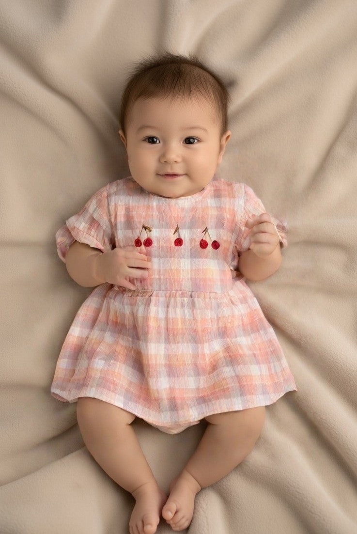 Baby body dress in pink with fresh twist on your baby girl dress collection, baby girl dress is made with 100% breathable cotton. The best baby gifts online.
