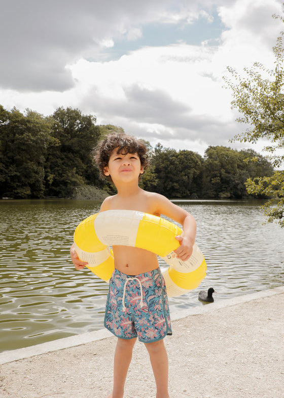 Boys swim shorts Aderi in Teal Garden of Eden print by Louise Misha – SPF 50, recycled fabric | Milimilu