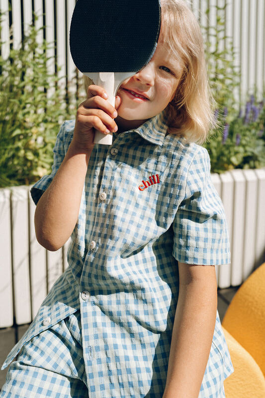 The best summer shirt for boys and tweens. This lightweight summer shirt with embroidery -Chill this summer shirt is extra light. The best kids clothing online.