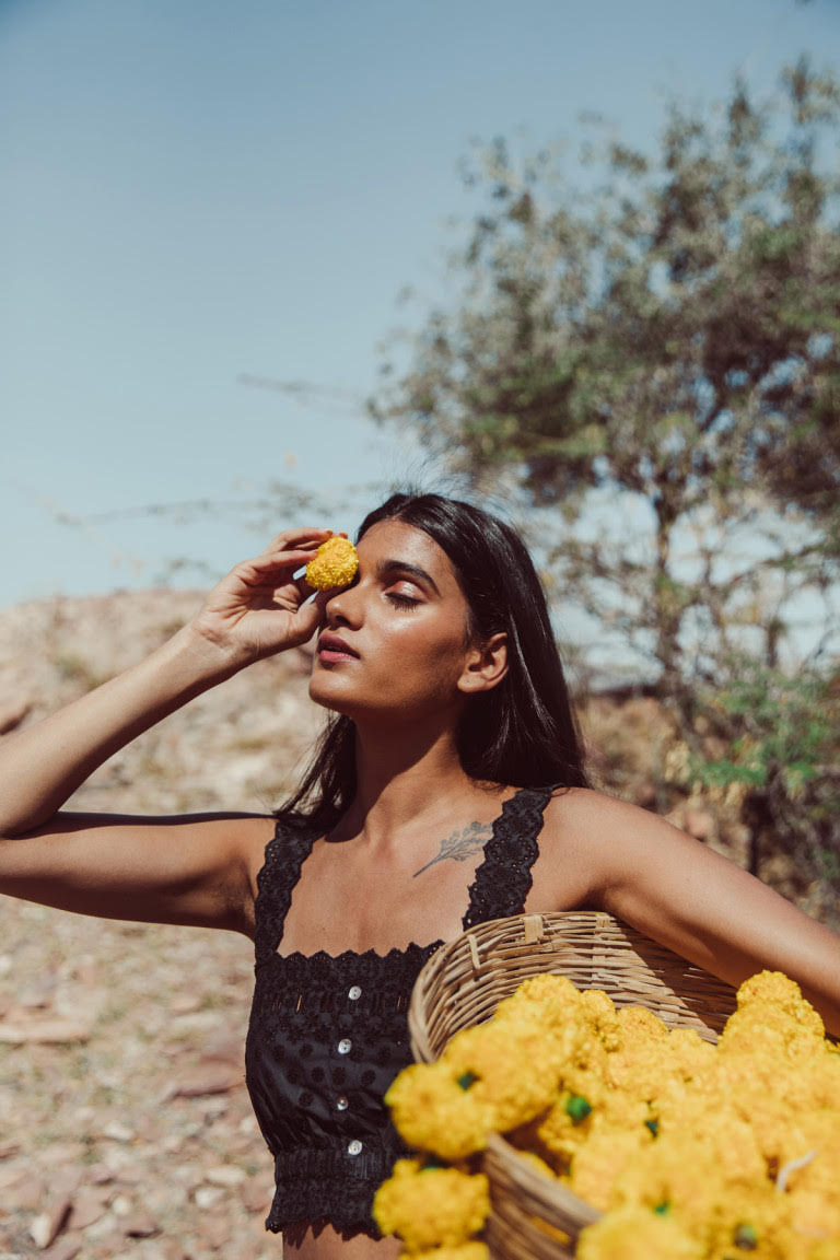 Women black cropped top Kivima with most beautiful embroidery details and is made with organic cotton by Louise Misha. Shop sustainable women fashion online.