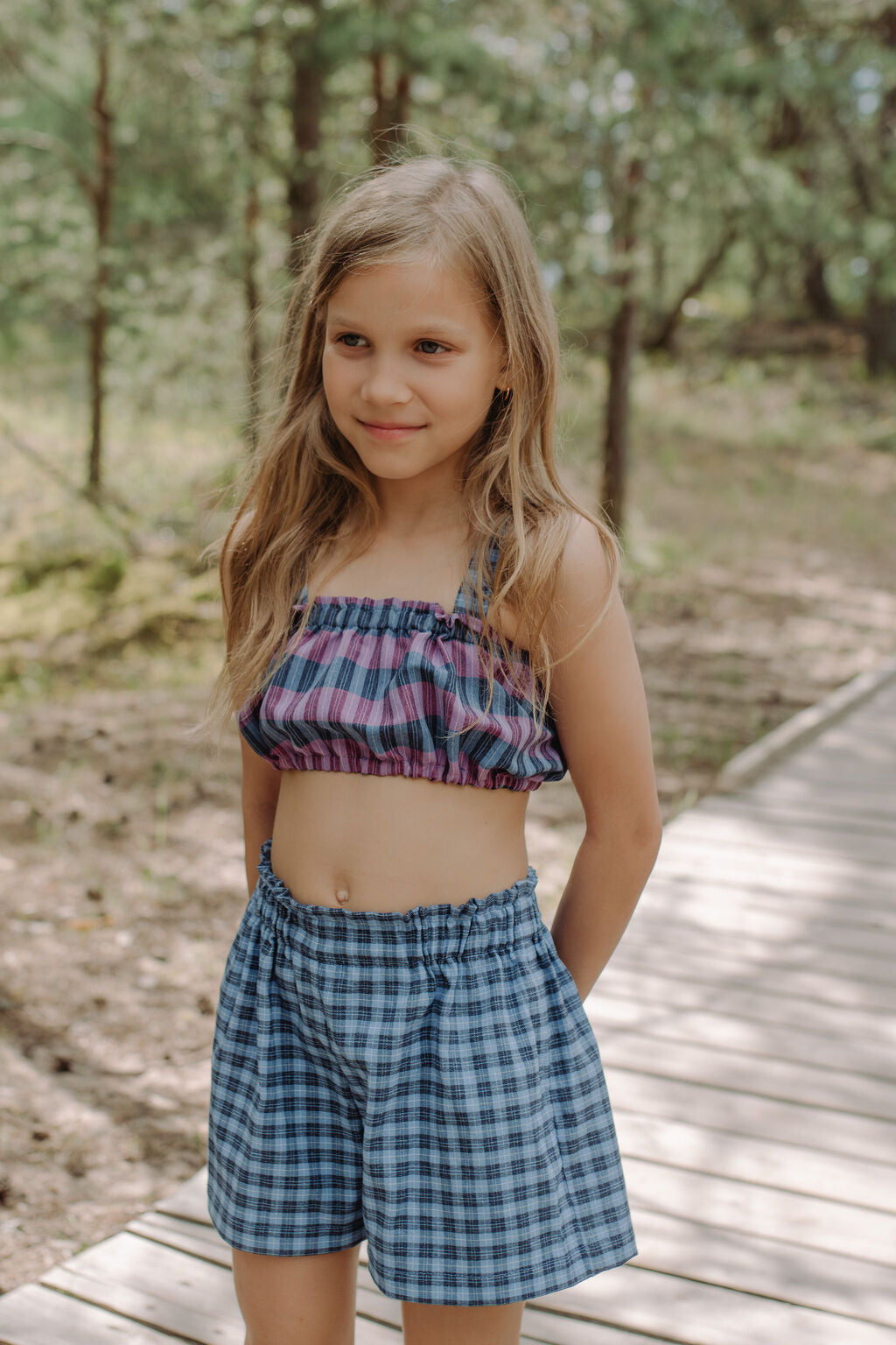 Comfort and style come together with our girl shorts Oti in Bright and match it for girl outfit set. These checked blue cotton shorts are easy to wear and practical. Mommy and Me fashion is available.