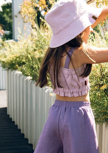 This kids bucket hat is the perfect choice for summer days, this lilacl linen bucket hat for kids is breathable and easy to wear hat that kids keep on.
