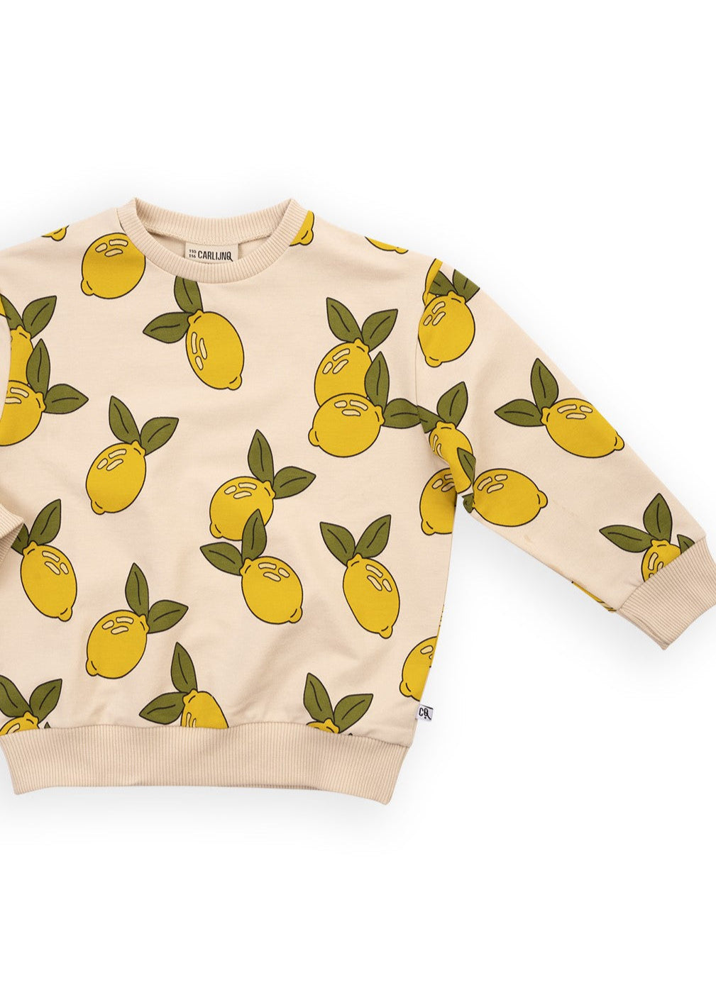 The organic cotton kids jumper with lemon print at MiliMilu Lifestyle, shop sustainable kids clothing and organic cotton kids clothing for trendy kids online.