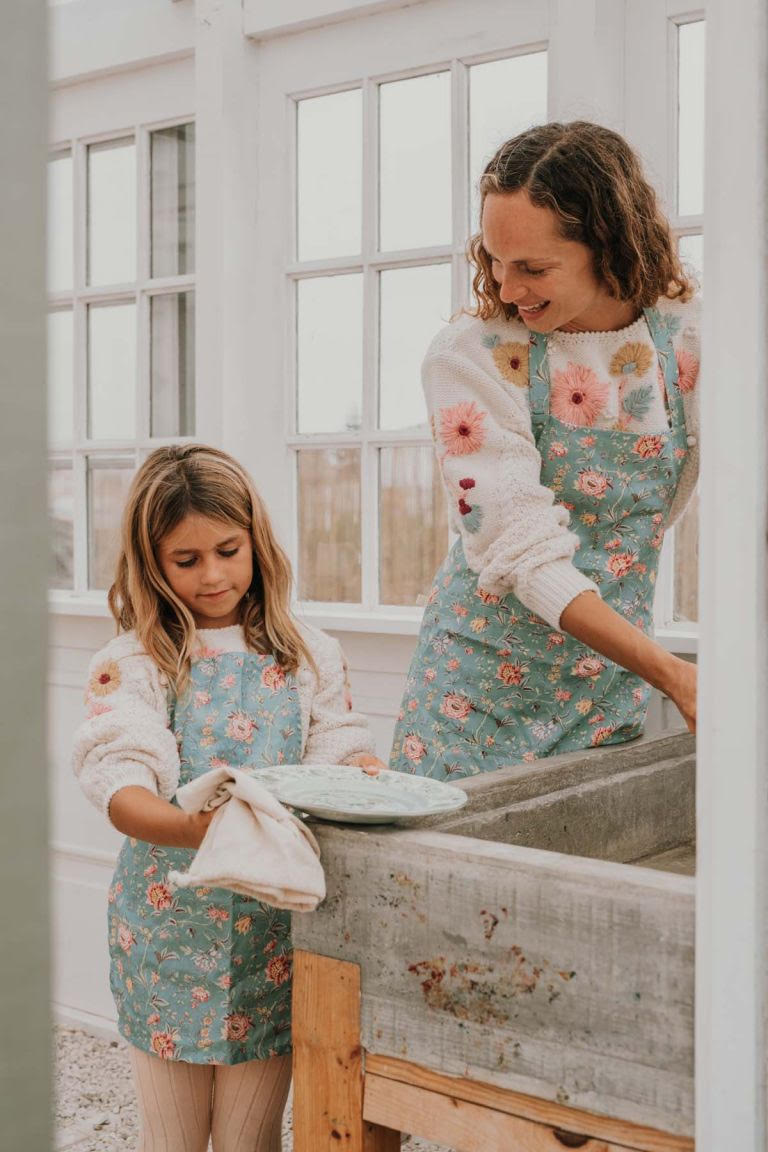Organic cotton kids aprons in beautiful print online at MiliMilu. The Mini-me apron style is available by Louise Misha. The best Mommy and Me time together!
