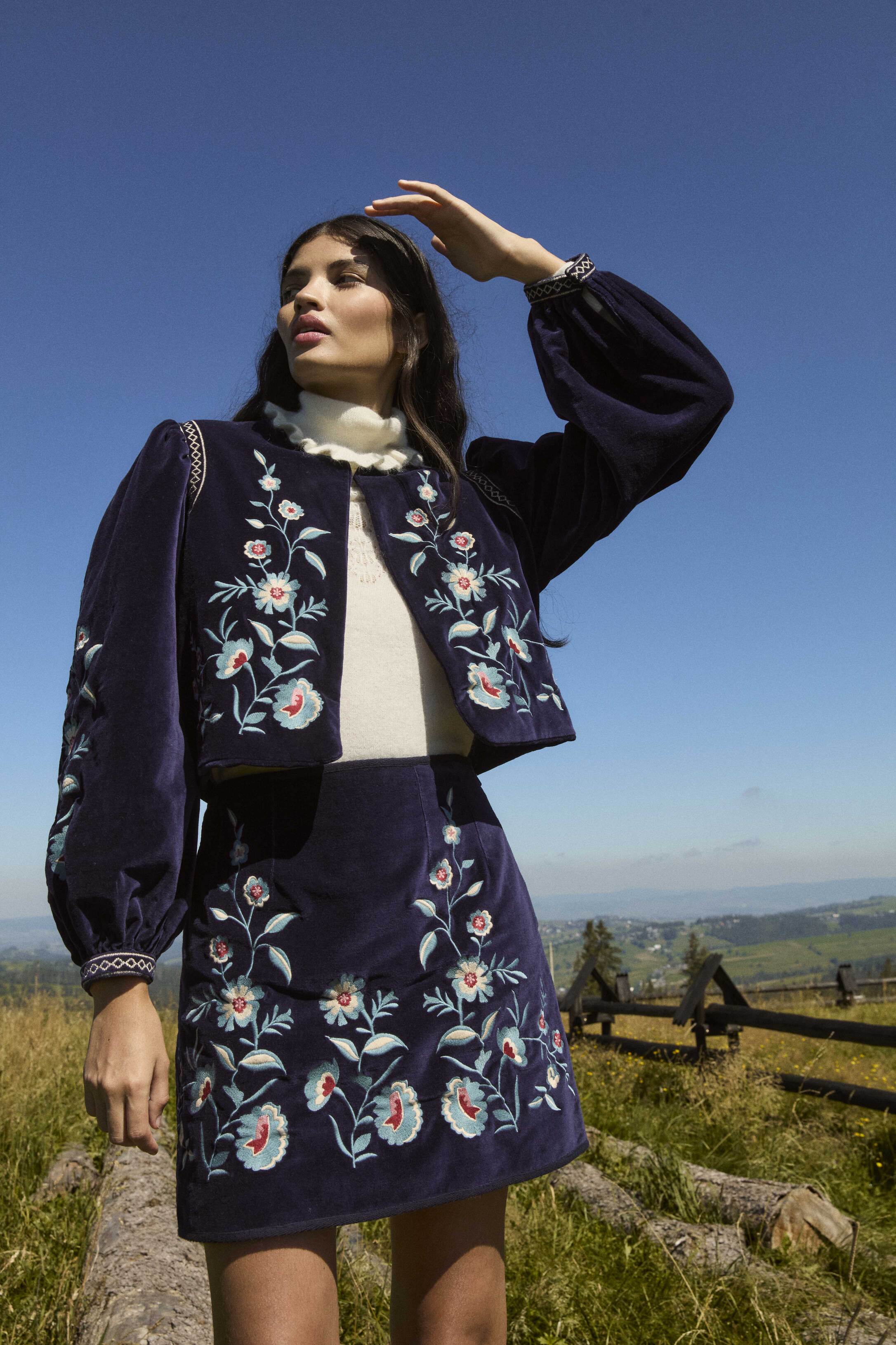 The high waisted skirt is must have womans sustainable wardrobe, made with organic cotton in a midnight color, this skirt features velvet texture with embrodery