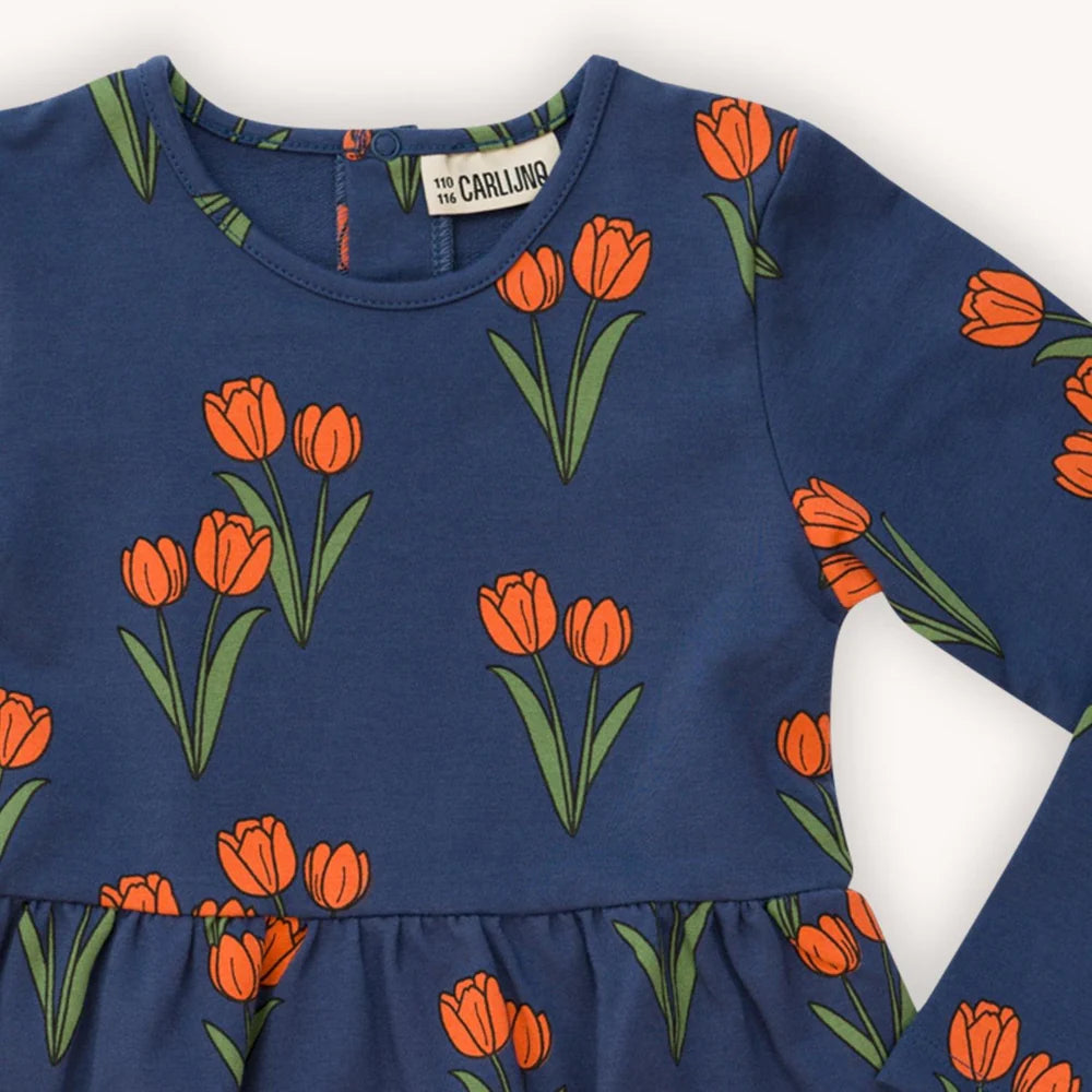 Organic cotton girls and teen dress with a unique tulip print for colder weather - warm dress to keep you trendy during the winter. Girls winter dress and festive dress from organic cotton. Best present for kids online.