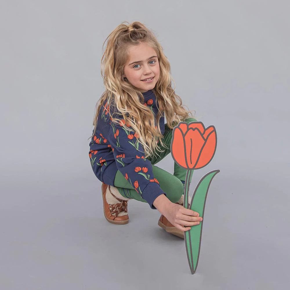 Shop girls and teen sweaters with all-over tulip print. Organic cotton kids clothing online from toddler sizing up to teen fashion. The best gifts and presents for kids and sustainable gifts online.