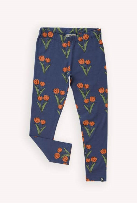 Shop girls leggings ( sizes from baby to teen leggings!) in this dark blue base with an all-over tulip print. Shop organic cotton leggings and organic cottong kids clothing - also the best sustainable gifts for kids.