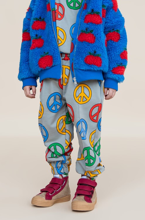 Kids Peace joggers in organic cotton showing Peace design print